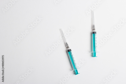 Medical syringe on a white background