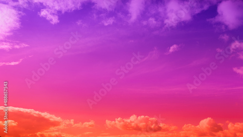 beautiful vivid Coral purple orange Sky wallpaper at Sunset with clouds. darmatic Sunshine sky, Beautiful View, evening clouds fast moving away photo