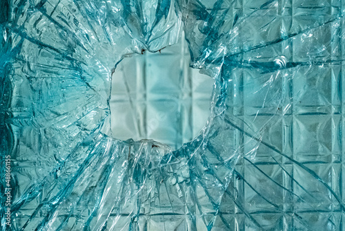 war. building after the bombing. destroyed building. broken glass texture. shard of broken glass