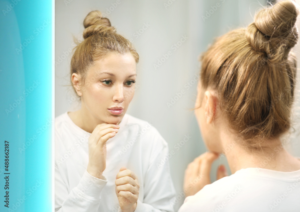 Magic anti-aging cream.Applying the cream. Magic anti-aging cream.Applying the cream.