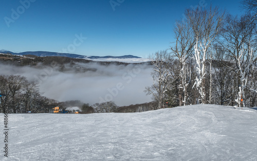 Top of the Ski Resort with Fog in the Valley 