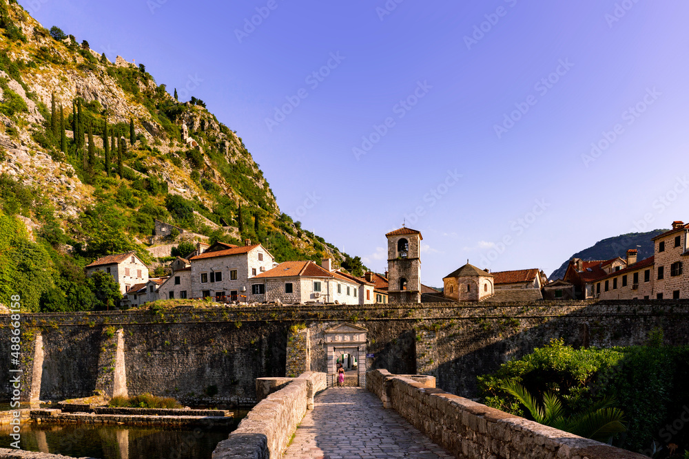 Entrance to old town of Kotor over bridge with fortress
