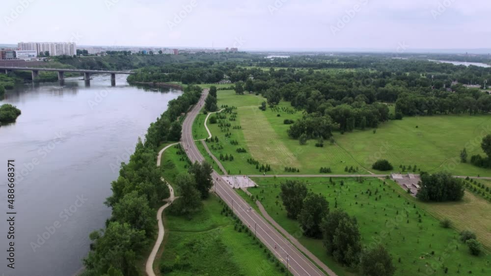 Green park, fly along the river on a drone. Green park, fly along the river on a drone.