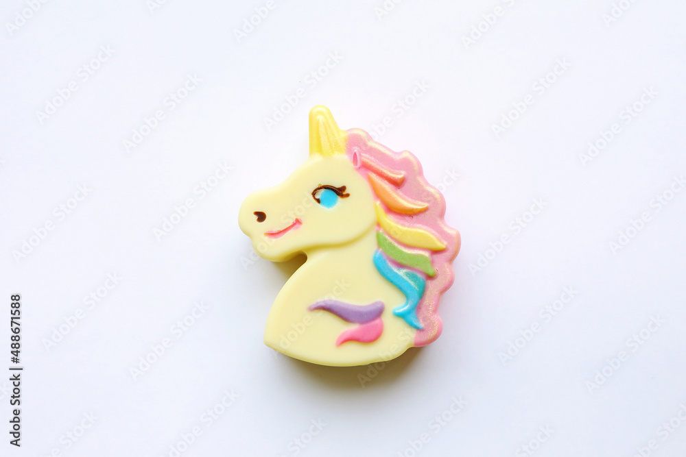 chocolate candy on a stick with a beautiful multicolored glaze chocolate candy on a stick with a beautiful multicolored glaze