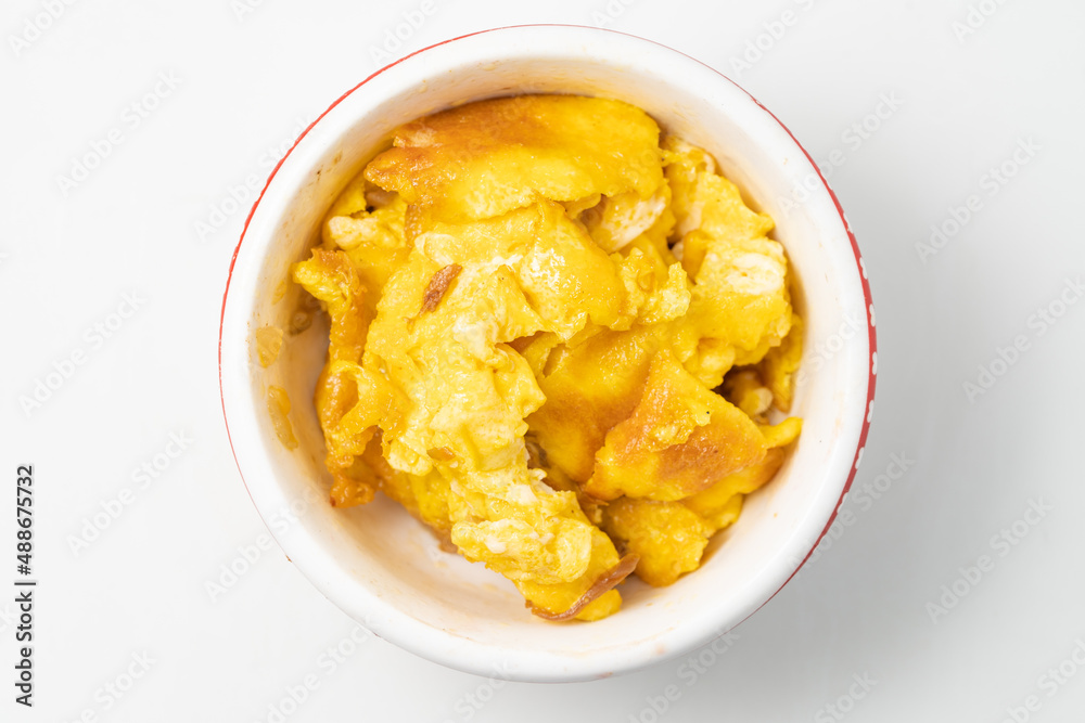 Small scrambled eggs on a monochrome background Small scrambled eggs on a monochrome background