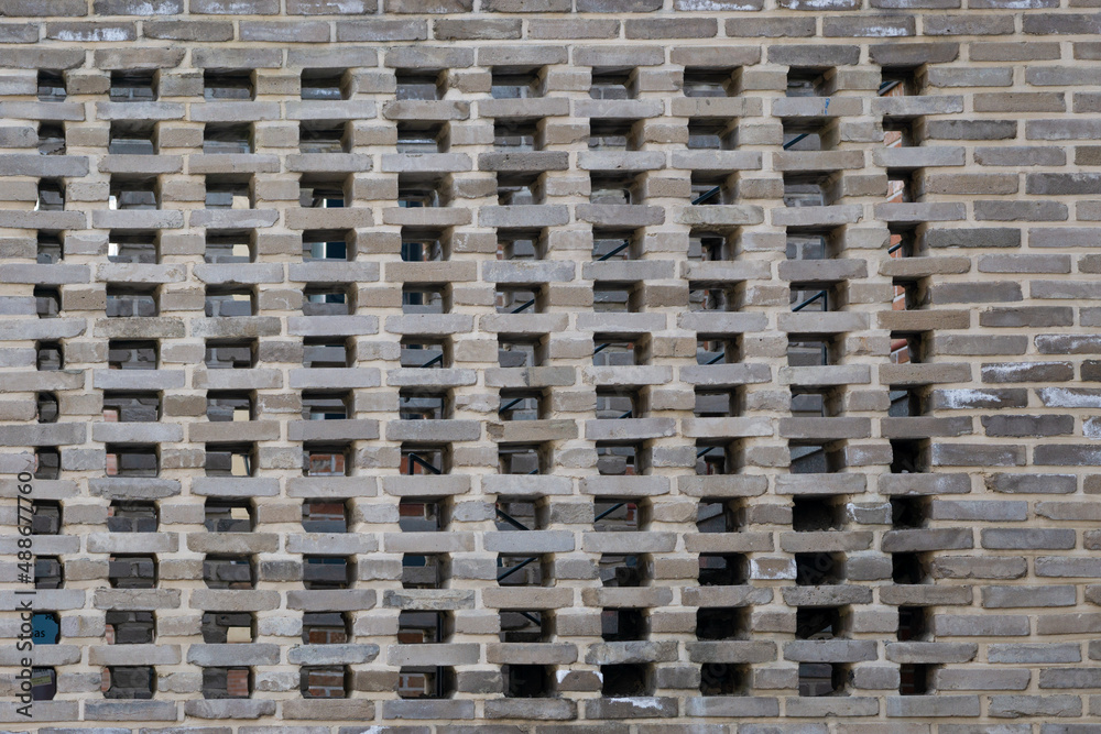 A house wall made of cement bricks