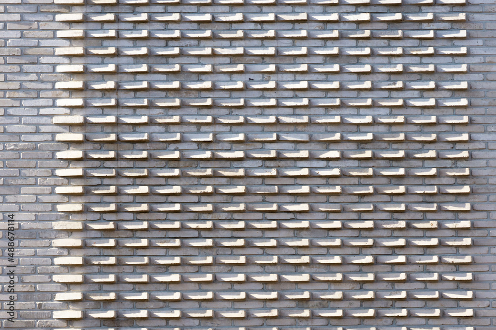 Brick construction with a mixture of gray and brown black Brick construction with a mixture of gray and brown black