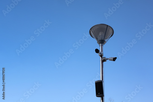 Mercury street lamp on cloudy sunny weather background