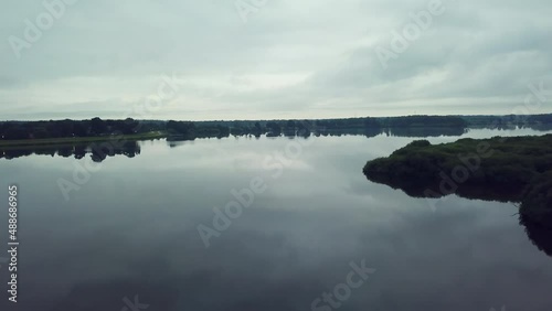 Thülsfelder lake near the dam cold morning atmosphere slow moving drone footage 4k cloudy photo