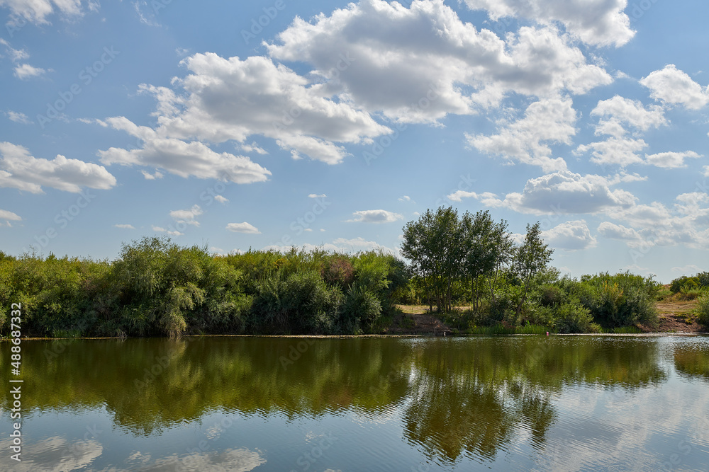 landscape lake and forest with blue sky