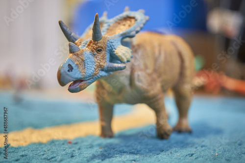 A closeup shot of a Mercuriceratops toy from the CollectA brand photo