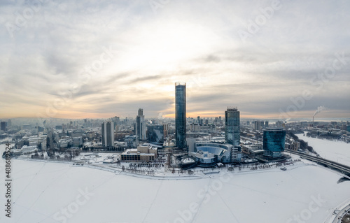 Yekaterinburg aerial panoramic view in Winter at sunset. Yekaterinburg city and pond in winter.