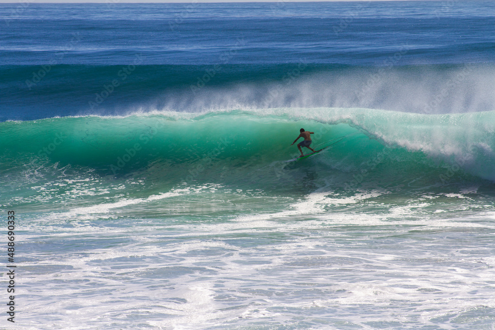 Surfing a barrel in Australia