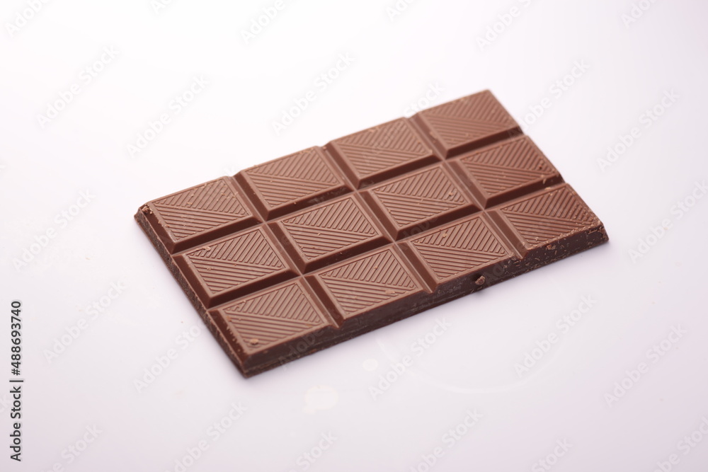 Milk chocolate bar on white background Milk chocolate bar on white background