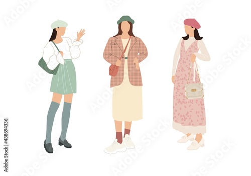 A set of stylish people in fashionable casual outfits with accessories and bags. Young modern women in fashionable spring and summer clothes. Color flat illustration isolated on a white background