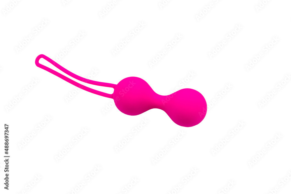 Ben Wa balls or Geisha balls isolated on white background. Pink double vaginal balls Ben Wa balls or Geisha balls isolated on white background. Pink double vaginal balls