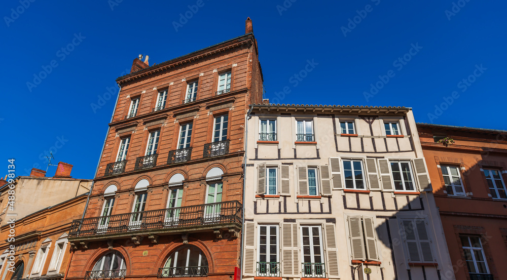 Fototapeta premium Facades of houses in Toulouse in Occitanie, France
