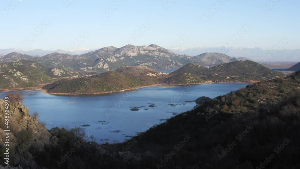 AERIAL - Lake Skadar, valley, and mountains, Montenegro, forward shot AERIAL - Lake Skadar, valley, and mountains, Montenegro, forward shot