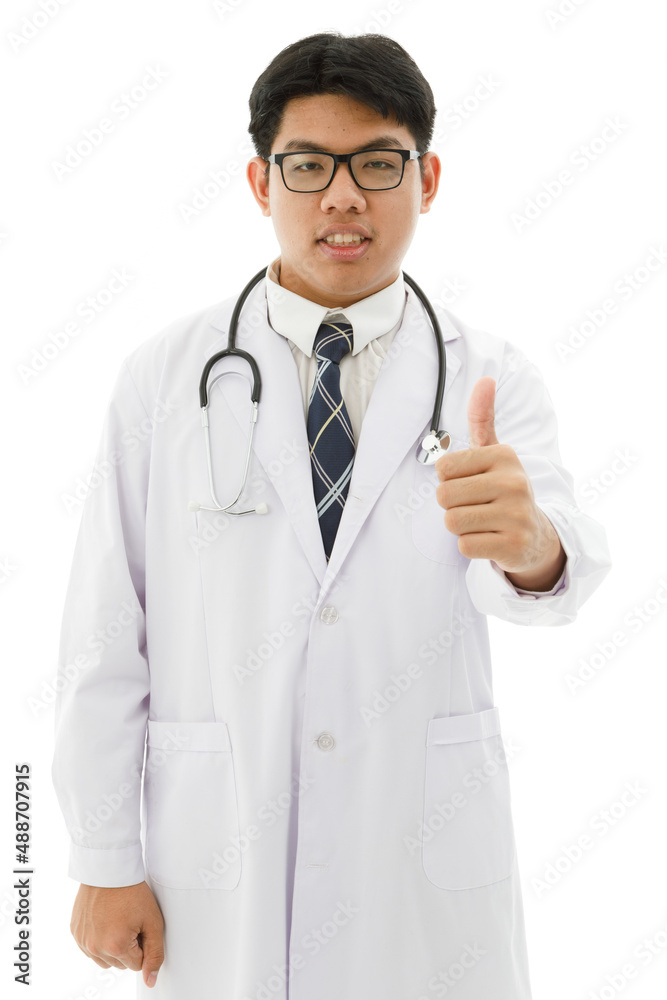 Isolated cutout studio shot of Asian young professional male doctor in lab coat with stethoscope and eyeglasses standing holding scrolling touchscreen tablet reading patient data on white background