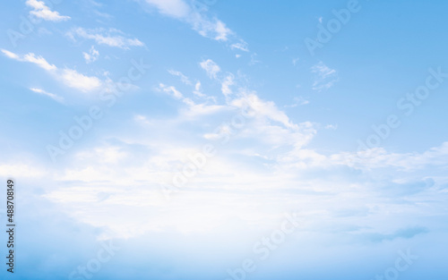 Beautiful Blue Sky with Clouds. Heavenly Dreamy Fluffy Fantasy Clouds Background.