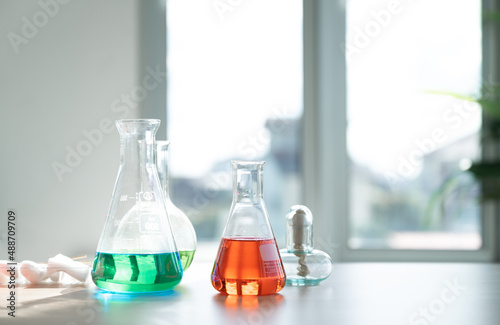 Copy space science glassware with window background 