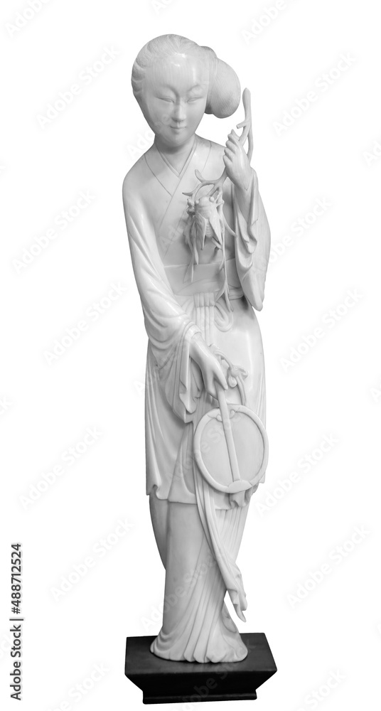 Geisha figurine in national dress, kimono traditional hair, fan in her hand. Souvenir doll, isolated on white background with clipping path Geisha figurine in national dress, kimono traditional hair, fan in her hand. Souvenir doll, isolated on white background with clipping path
