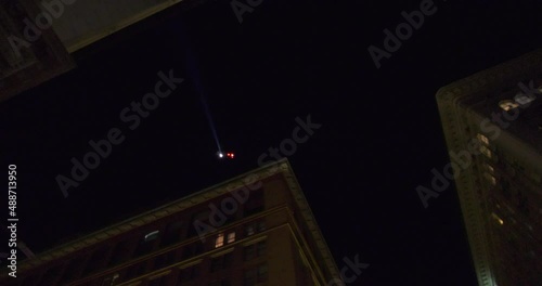 Police helicopter conducting an aerial search photo