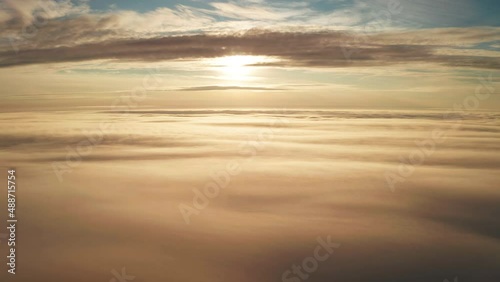 Aerial view of the mountains in the clouds at sunset. Faroe islands photo