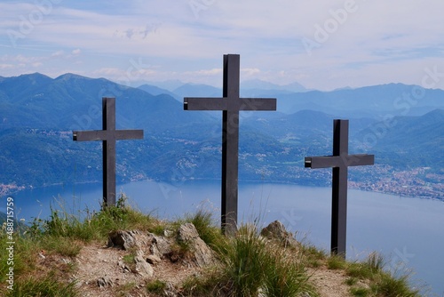 Three crosses on top of Cima di Morissolo overlooking lake Maggiore. Lombardy, Italy.