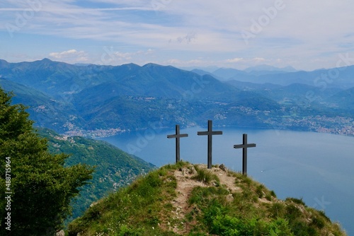 Three crosses on top of Cima di Morissolo overlooking lake Maggiore. Lombardy, Italy.