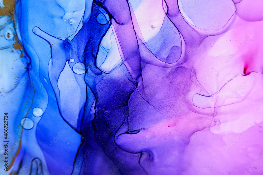 Abstract alcohol ink fluid art background in blue, purple, pink and gold