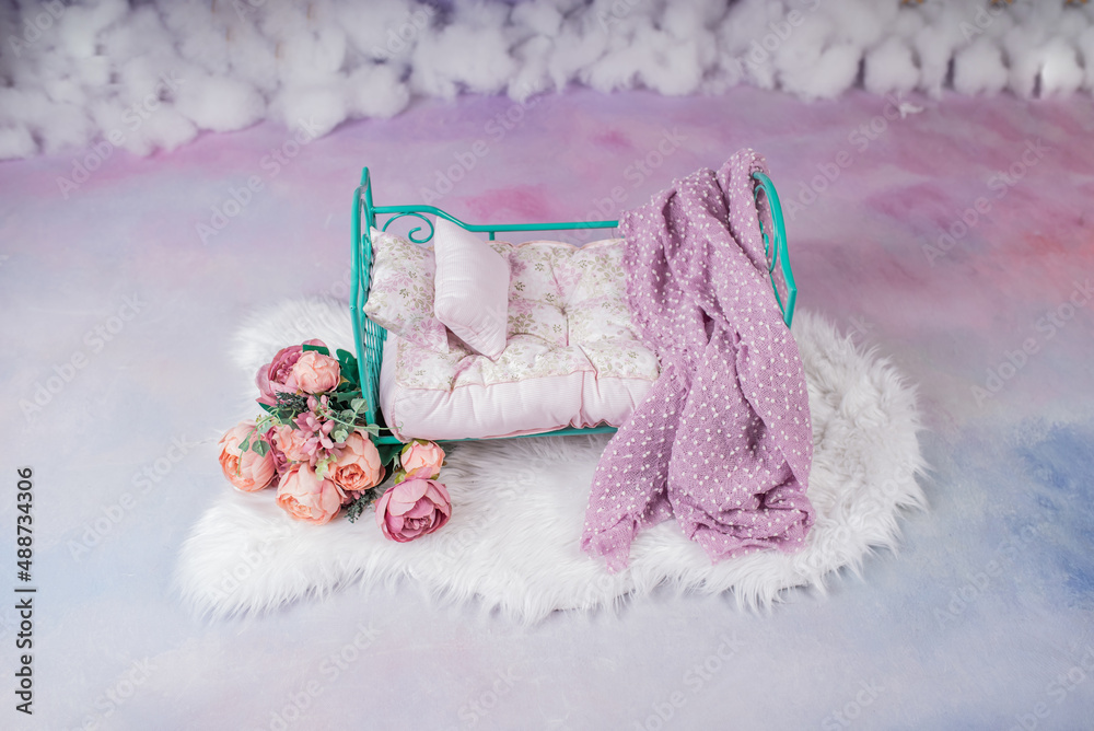 Newborn baby girl bed with pink flowers in a photo studio Stock Photo Adobe Stock