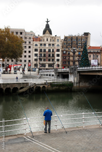 Fishing in the river of Bilbao