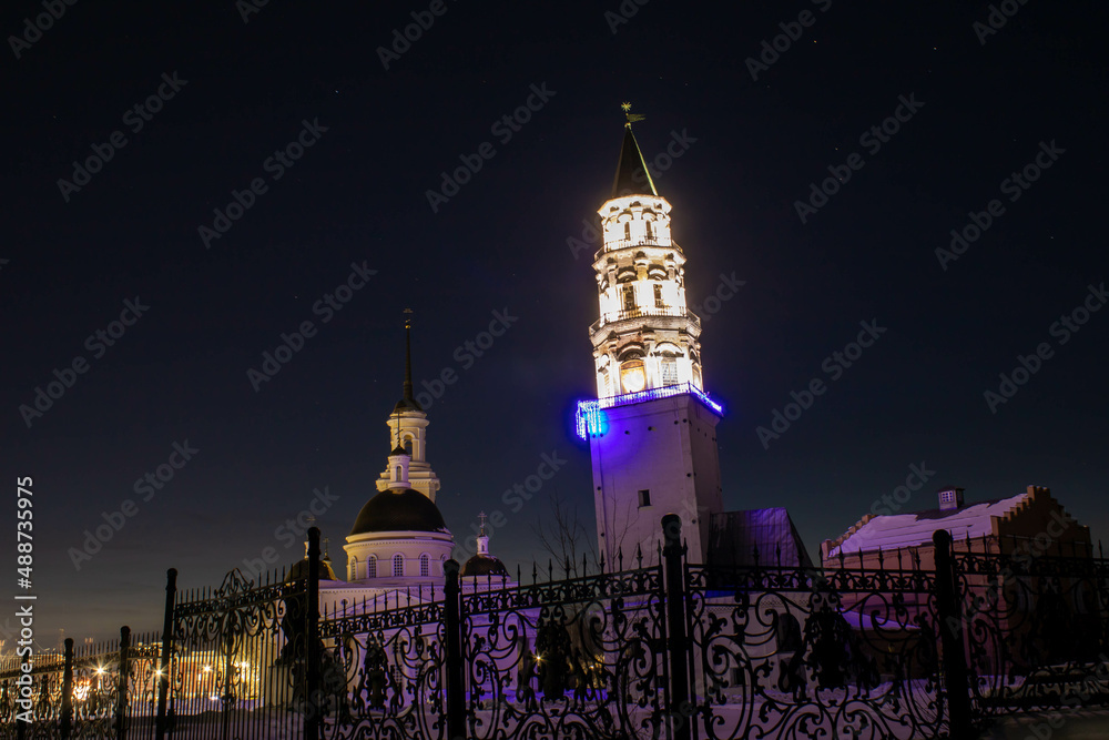Fototapeta premium Evening Nevyansk, Sverdlovsk region, Ural, Russia. February, 2022 Вечерний Невьянск, Свердловская область, Урал, Россия. Февраль, 2022 год. 