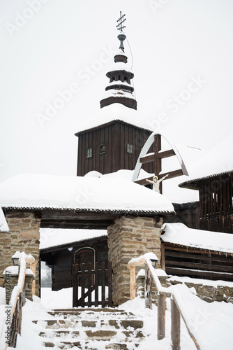 The Greek Catholic wooden church of St Michael the Archangel in Rusky Potok, Slovakia photo