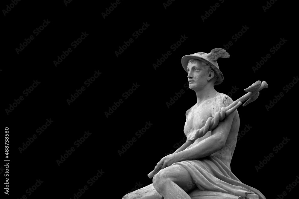 Black and white image of an ancient statue of antique god of commerce, business, merchants and travelers Hermes (Mercury). He also symbolizes cunning. Copy space. Black and white image of an ancient statue of antique god of commerce, business, merchants and travelers Hermes (Mercury). He also symbolizes cunning. Copy space.