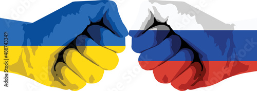 Hands with flags of Ukraine and Russia. Conflict between Russia and Ukraine.