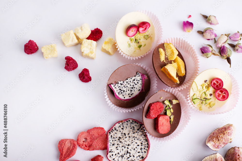 milk chocolate with different fillings and fruits milk chocolate with different fillings and fruits