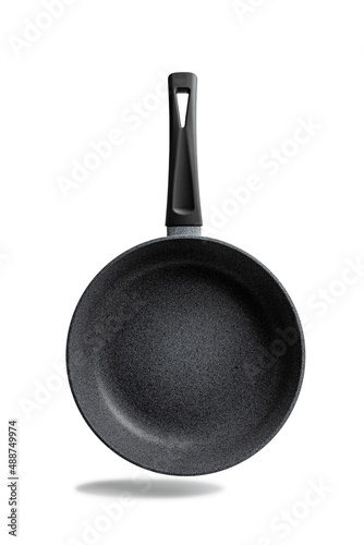 Empty metal frying pan with non-stick coating isolated on white background. Cast iron skillet with handle, grey, marble.