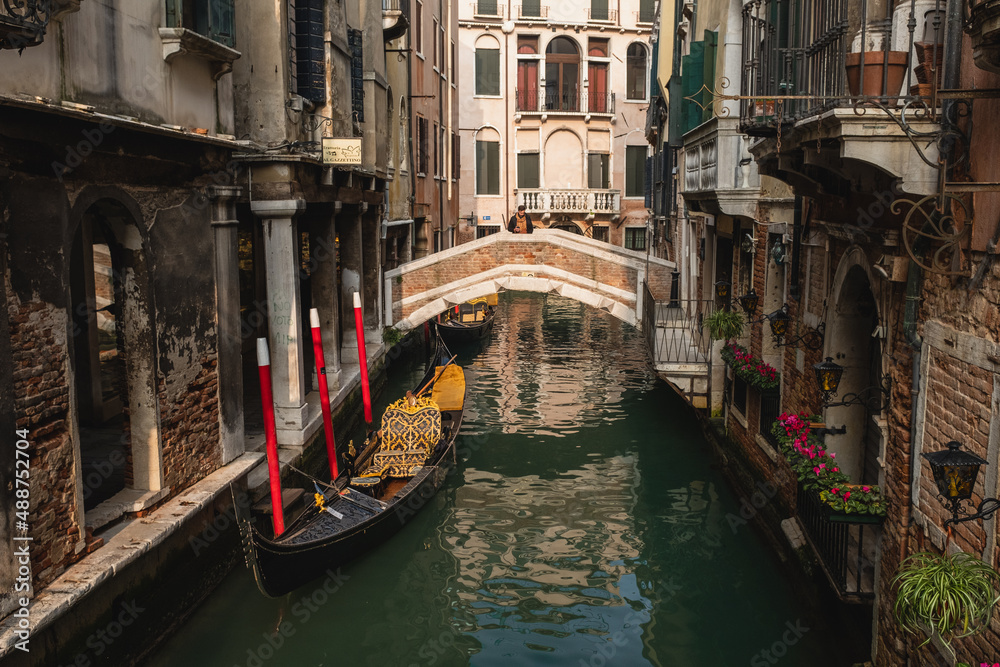 Gondola in picturesque Venice canal - Venice, Italy