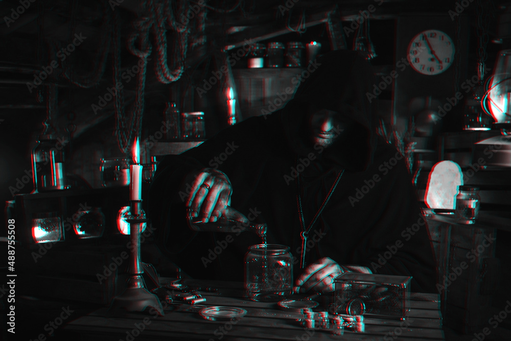 man in alchemist's costume in laboratory with jars by candlelight. Cosplay of computer game character with 3D glitch effect of virtual reality black and white