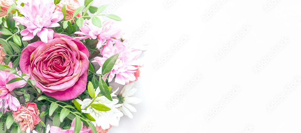 Floral arrangement with a place for text, horizontal banner on a white background. Spring flower background.