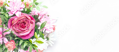 Floral arrangement with a place for text  horizontal banner on a white background. Spring flower background.