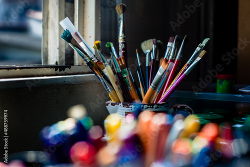 brushes in a glass