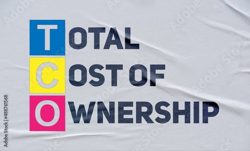 total cost of ownership, (TCO), written on white paper photo