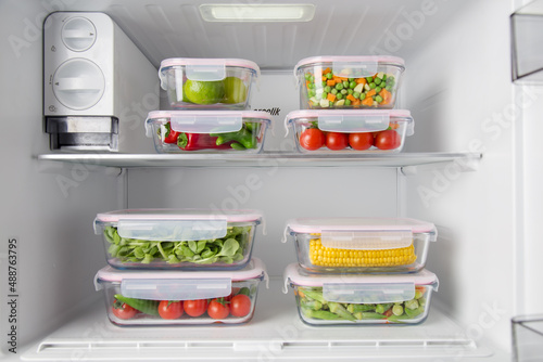 Healthy foods waiting in the deep freezer are in storage containers.