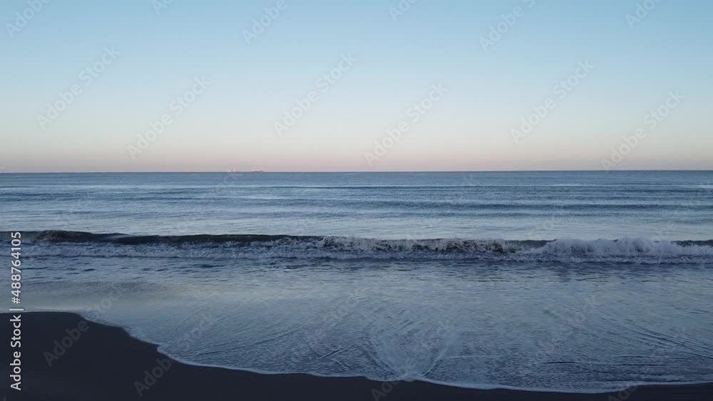 Drone shot of waves in the seashore. Drone shot of waves in the seashore.