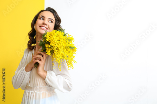 Beautiful young woman with ...