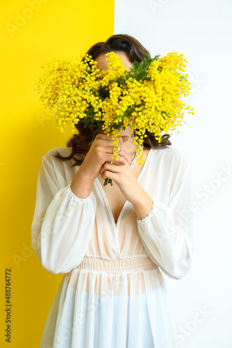Beautiful young woman with ...