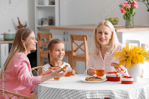 Young woman with her little...